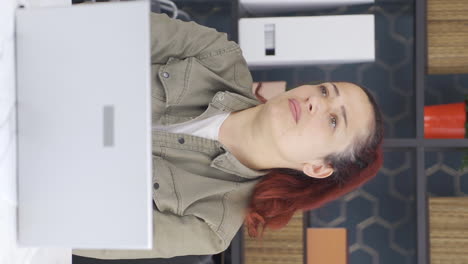 Vertical-video-of-Unmotivated-business-woman-unhappy-and-bored.